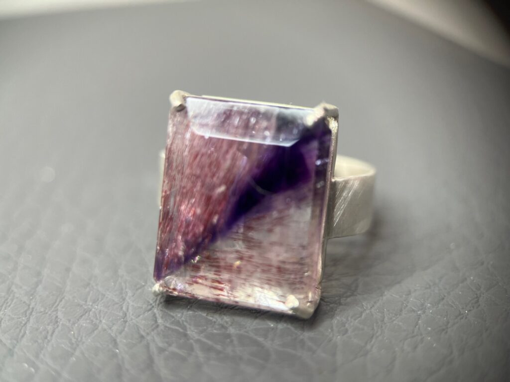 Large, emerald-cut purple quartz ring