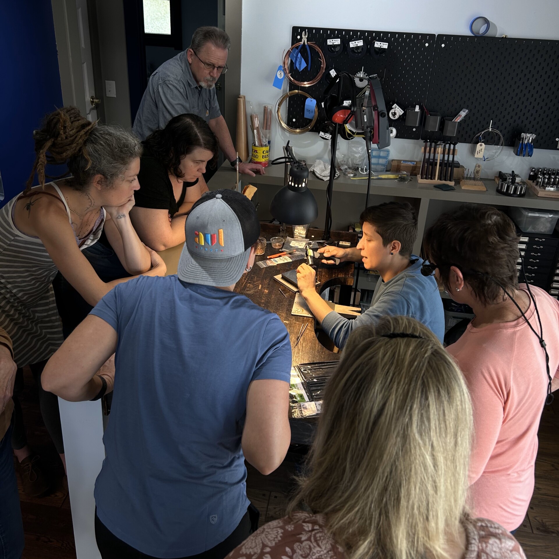 Torched Asheville Intro to jewelry and metalsmithing class students